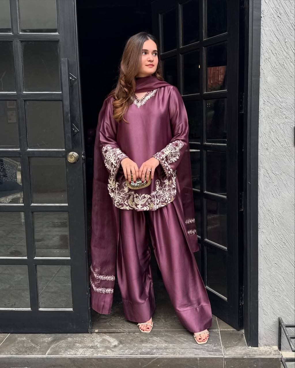 Majestic Aura A Woman's Journey in Lavish Purple Attire